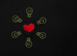 cuore fatto di filamenti circondato da sei lampadine